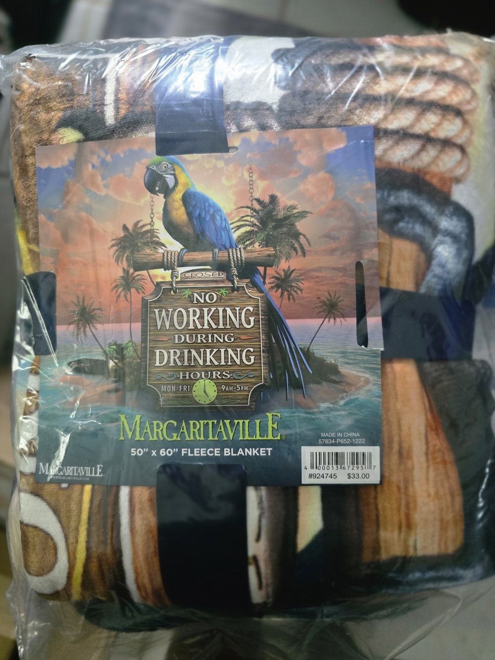 Margaritaville Tropical Parrot Fleece Throw in Blue, Yellow, Green